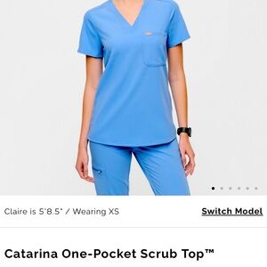 Brand: Figs 

Color: Ceil Blue 

Catarina One Pocket Scrub Top | L